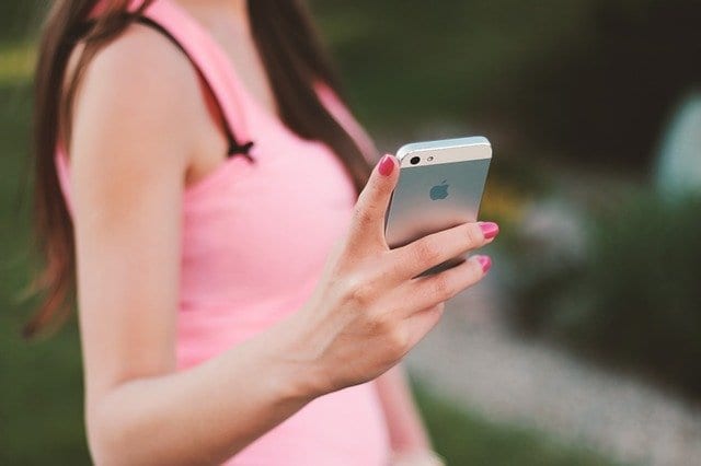 Holding iPhone