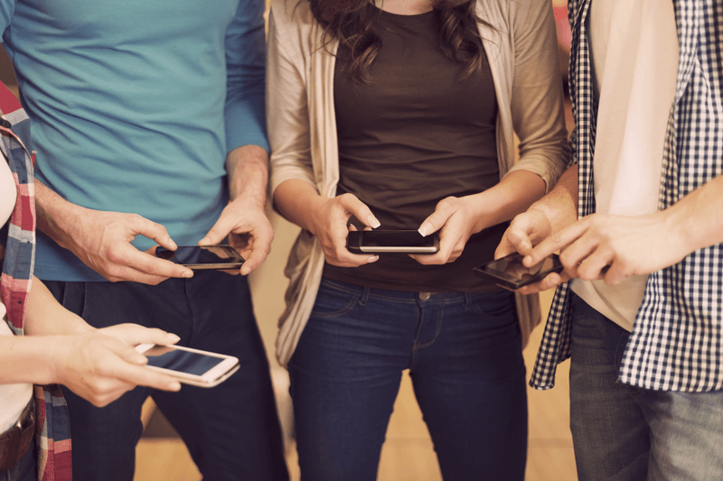 People engaging with brands on their mobile device People engaging with brands on their mobile device